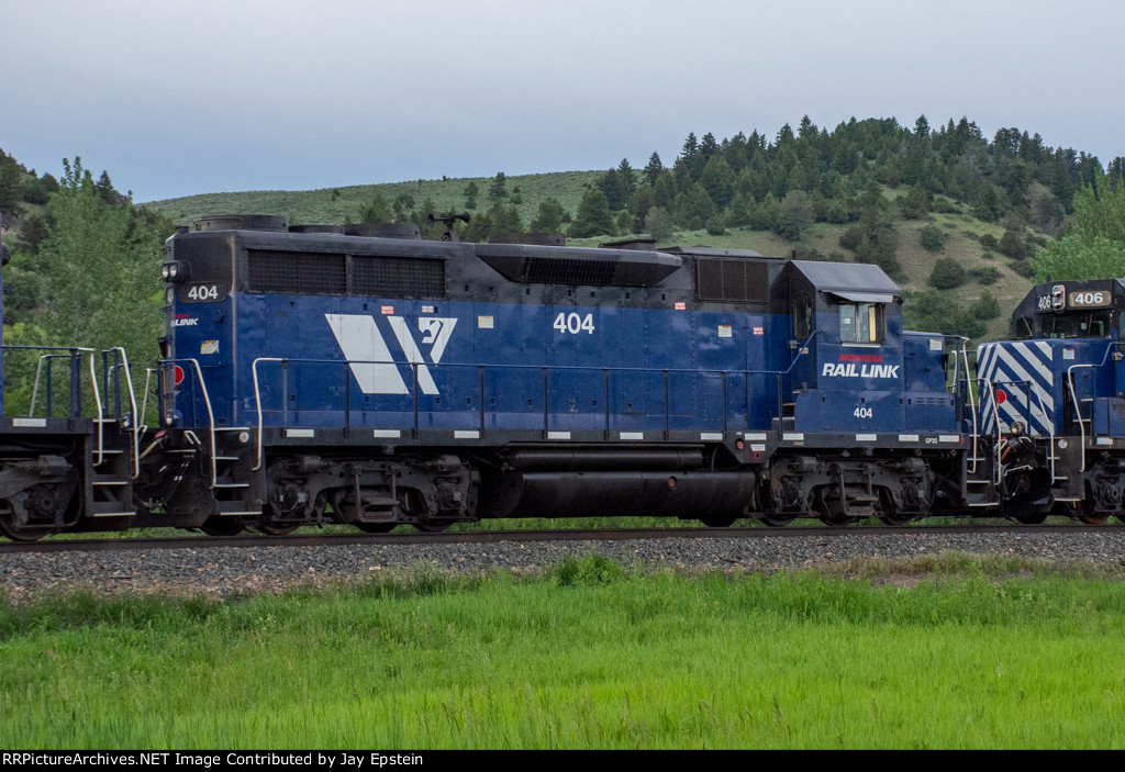 MRL 404 trails on a Westbound Ballast Train 